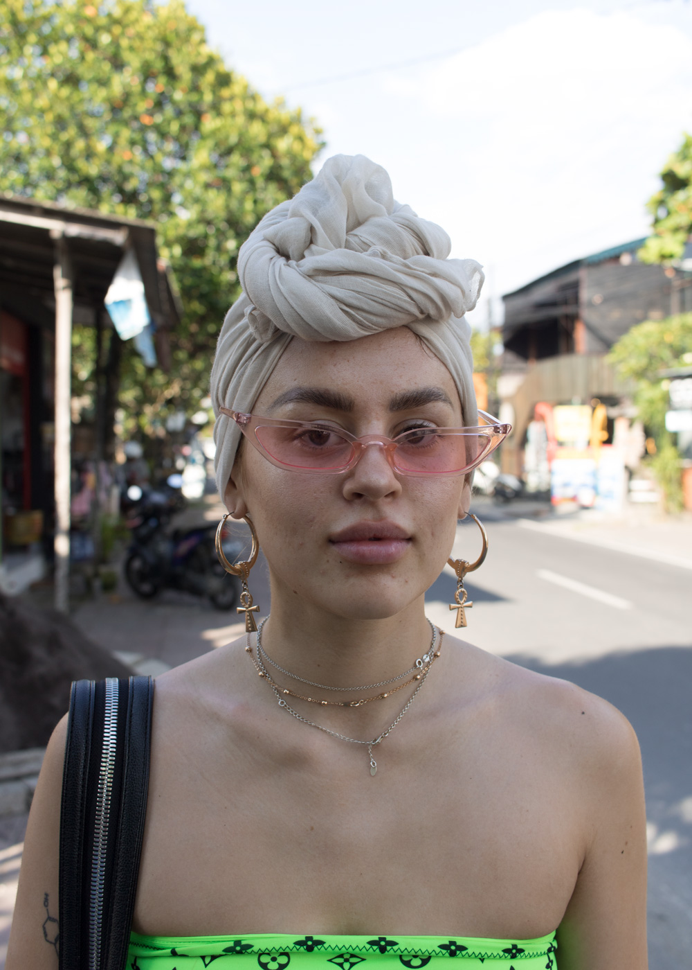 Street portrait of a young woman in Canggu Bali, before Photoshop